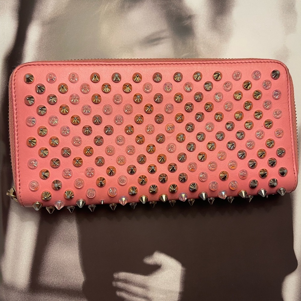 CHRISTIAN LOUBOUTIN!(Retail $890)Penneton Studded Wallet 💗💗💗(Missing 5 studs)